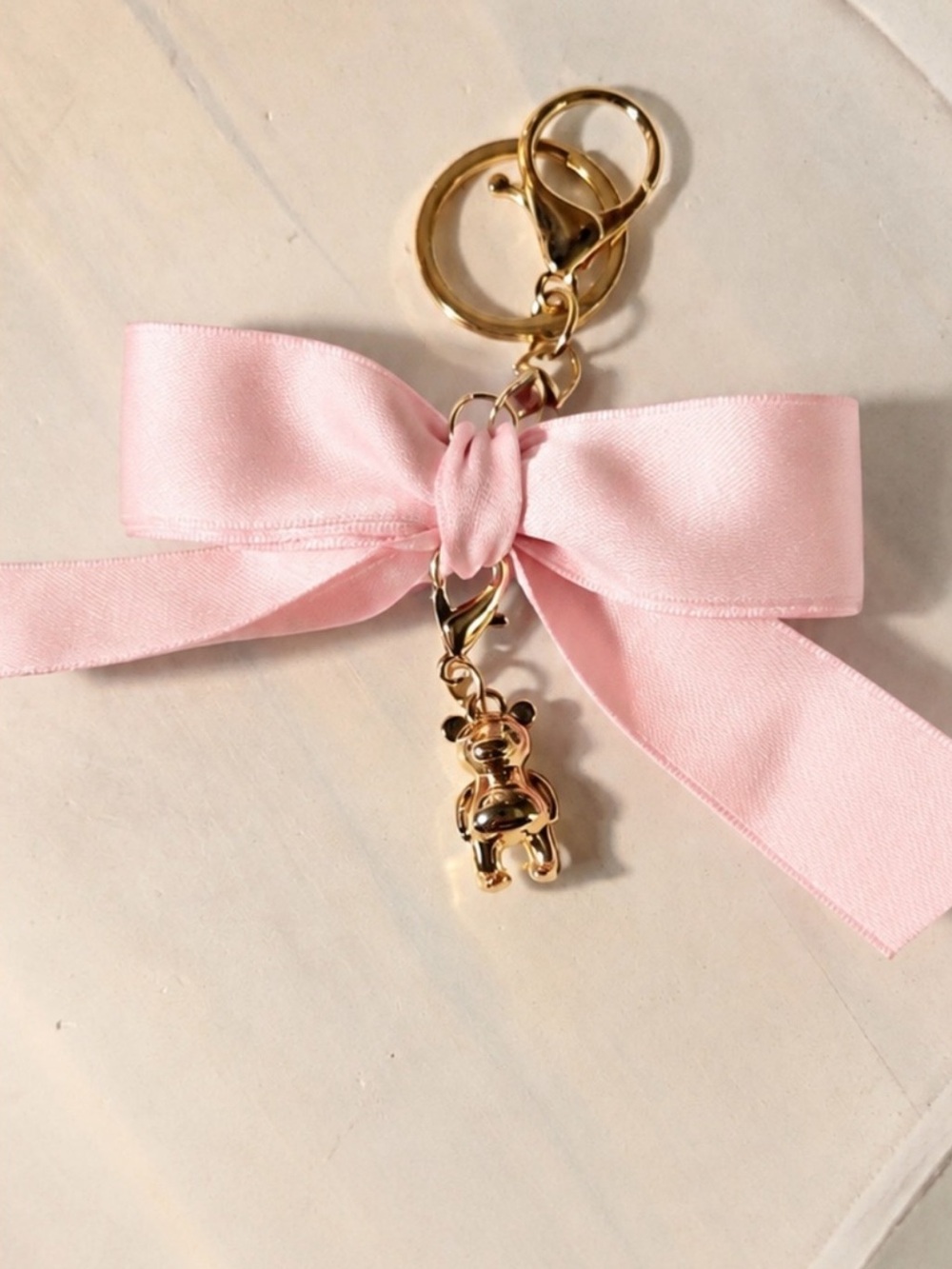 Coach Gold Bear Charm Keychain with Pink Ribbon Bow
